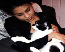 She has adopted a cute cat whom she named Jon.